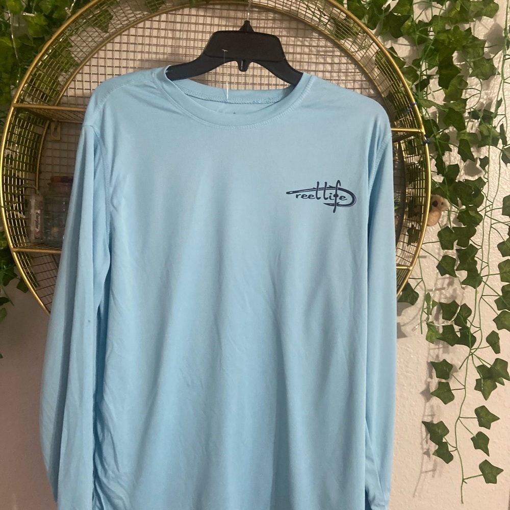 NWT. Reel life long sleeve shirt size medium.